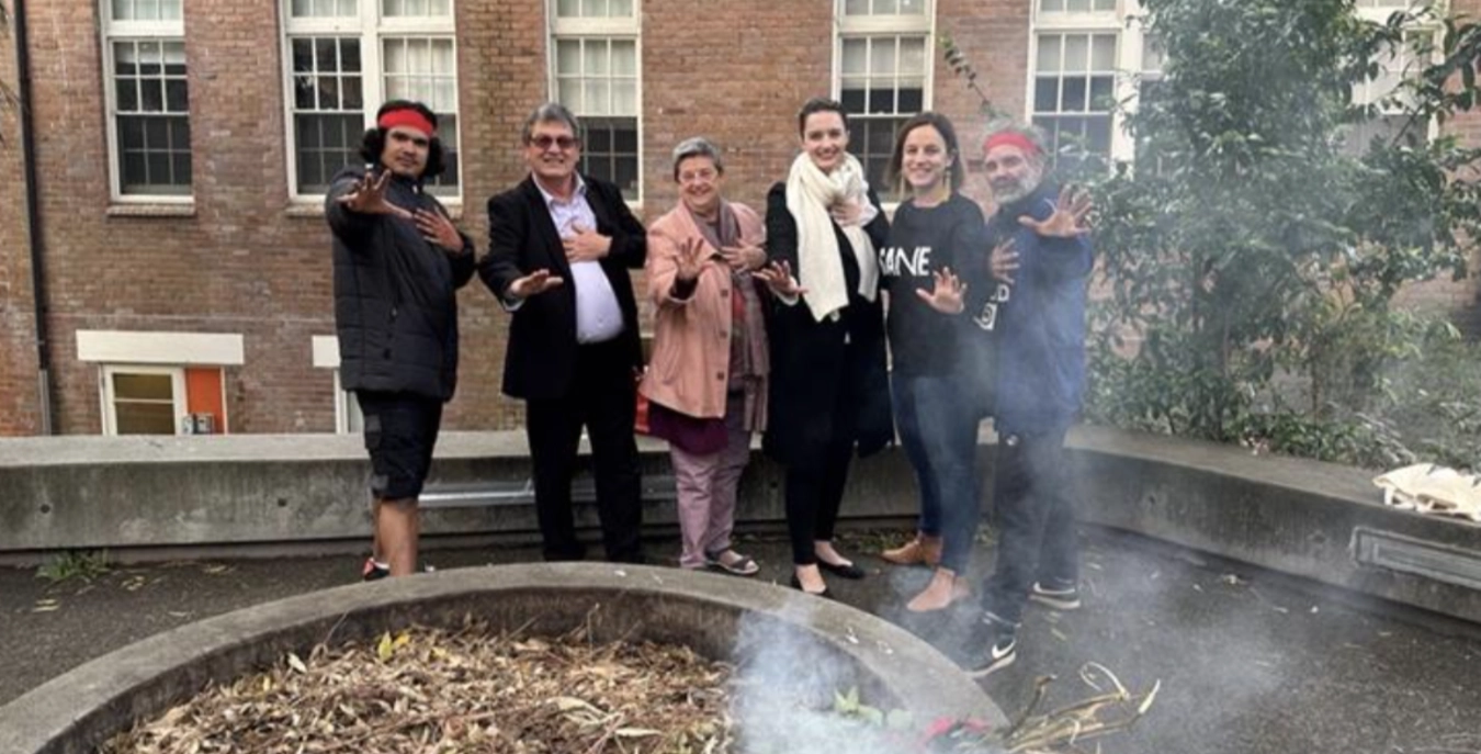 Rachel Green and Lucy Myers with indigenous representatives